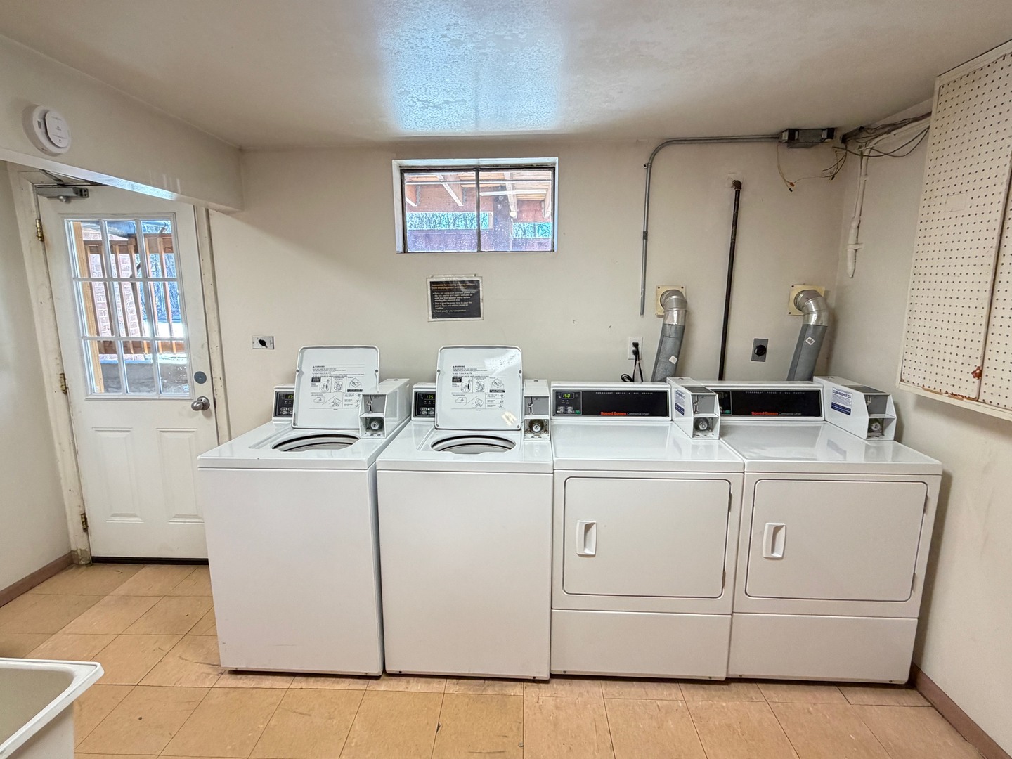1110 18th Street, Unit GE Broadview, IL 60155 - Photo 17 of 20 a room with dryer and washer