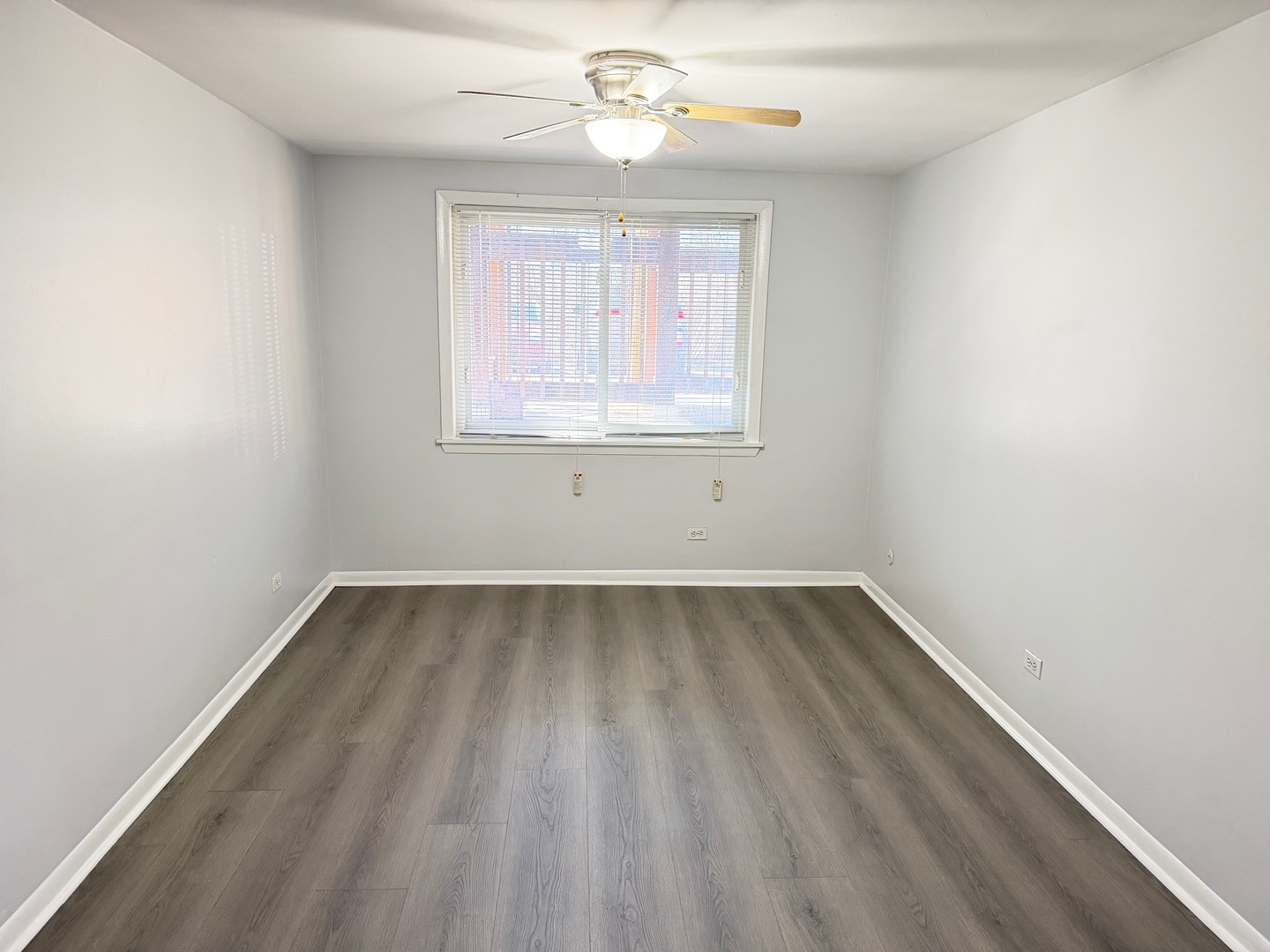 1110 18th Street, Unit GE Broadview, IL 60155 - Photo 8 of 20 an empty room with a window