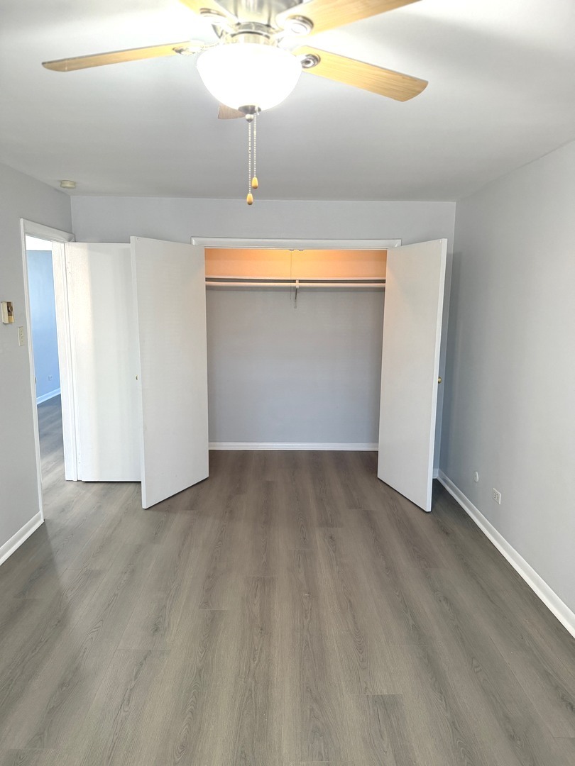 1110 18th Street, Unit GE Broadview, IL 60155 - Photo 9 of 20 an empty room with a empty space