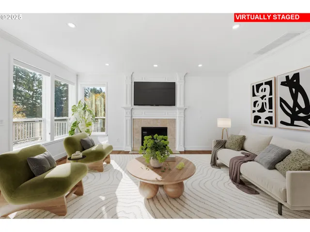 a living room with furniture a window and a fireplace