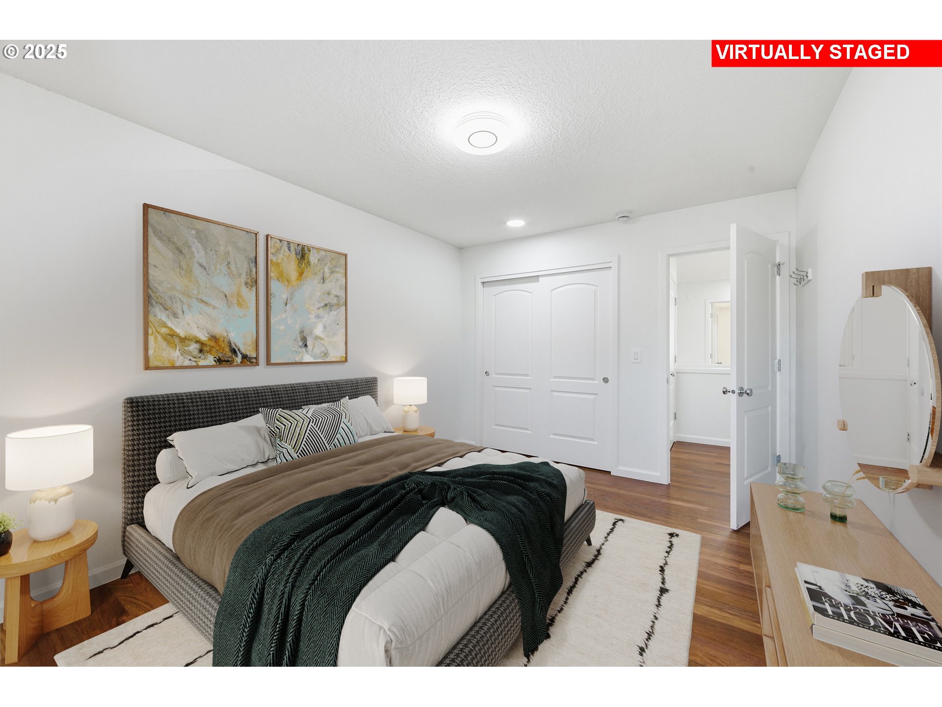 17808 Northwest Pioneer Road Beaverton, OR 97006 - Photo 28 of 43 a bedroom with a bed and a painting on the wall