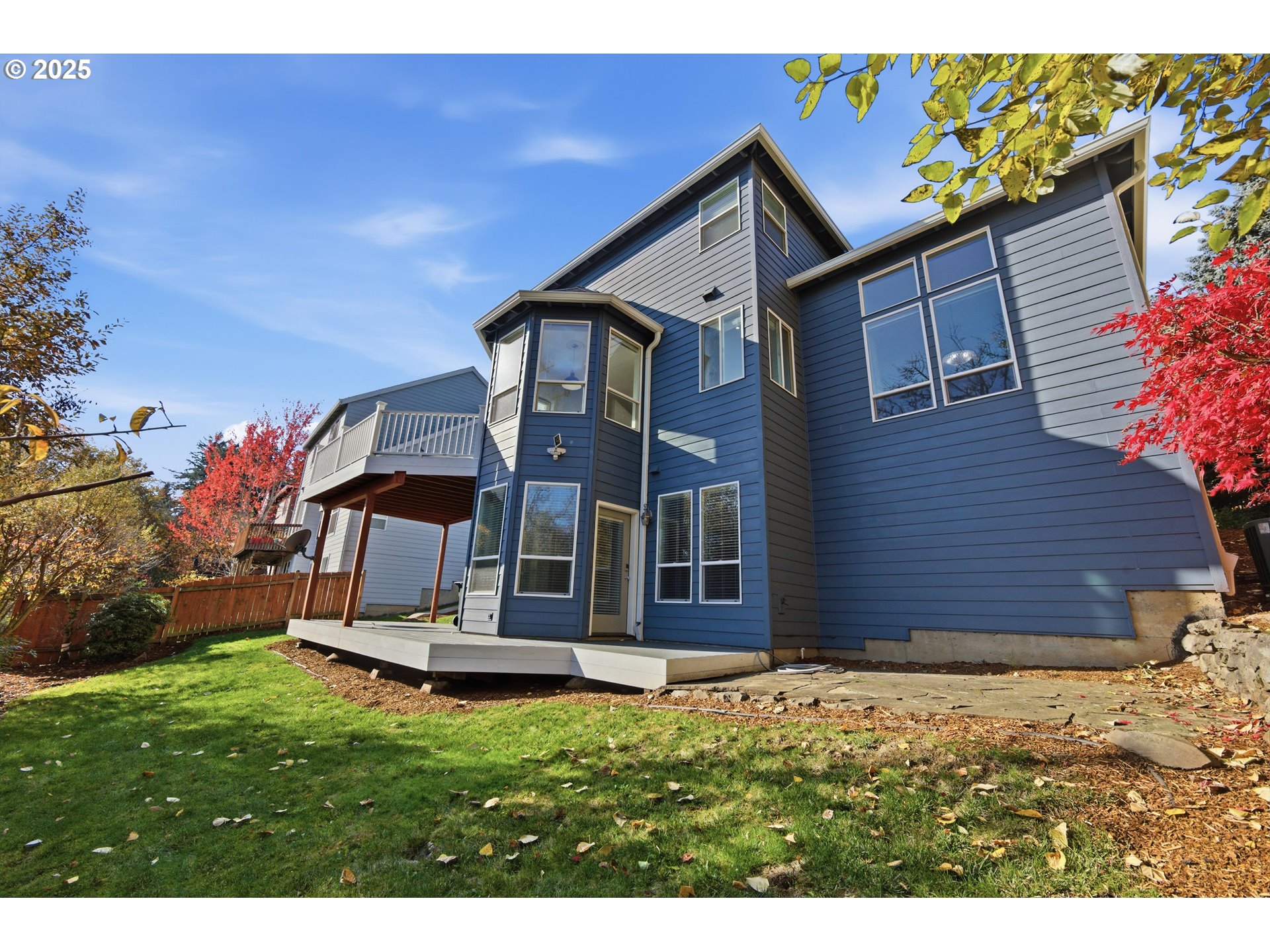 17808 Northwest Pioneer Road Beaverton, OR 97006 - Photo 40 of 43 a view of a house with a yard