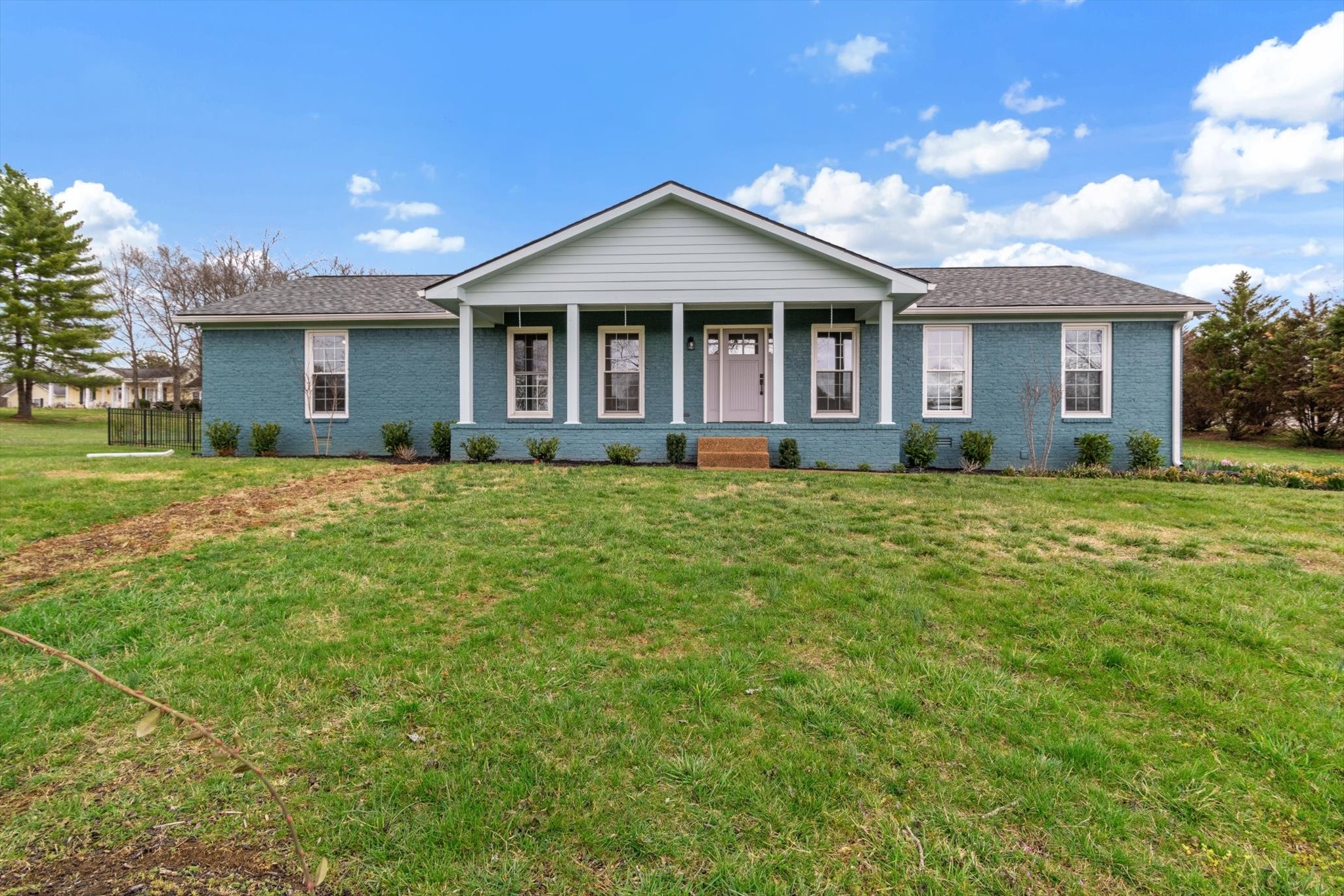 4158 Arno Road Franklin, TN 37064 - Photo 2 of 44 a front view of a house with a yard