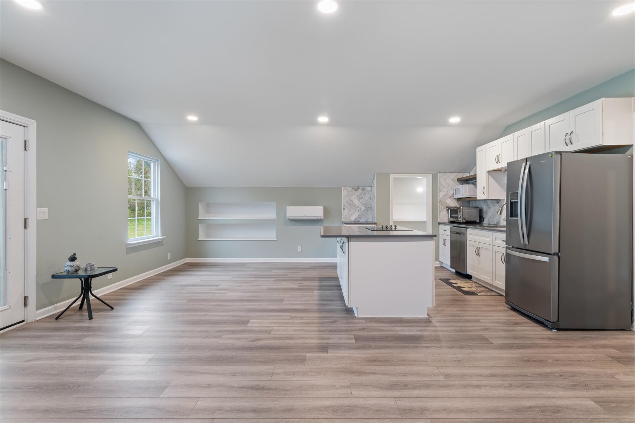 4158 Arno Road Franklin, TN 37064 - Photo 31 of 44 a view of a kitchen with wooden floor and electronic appliances