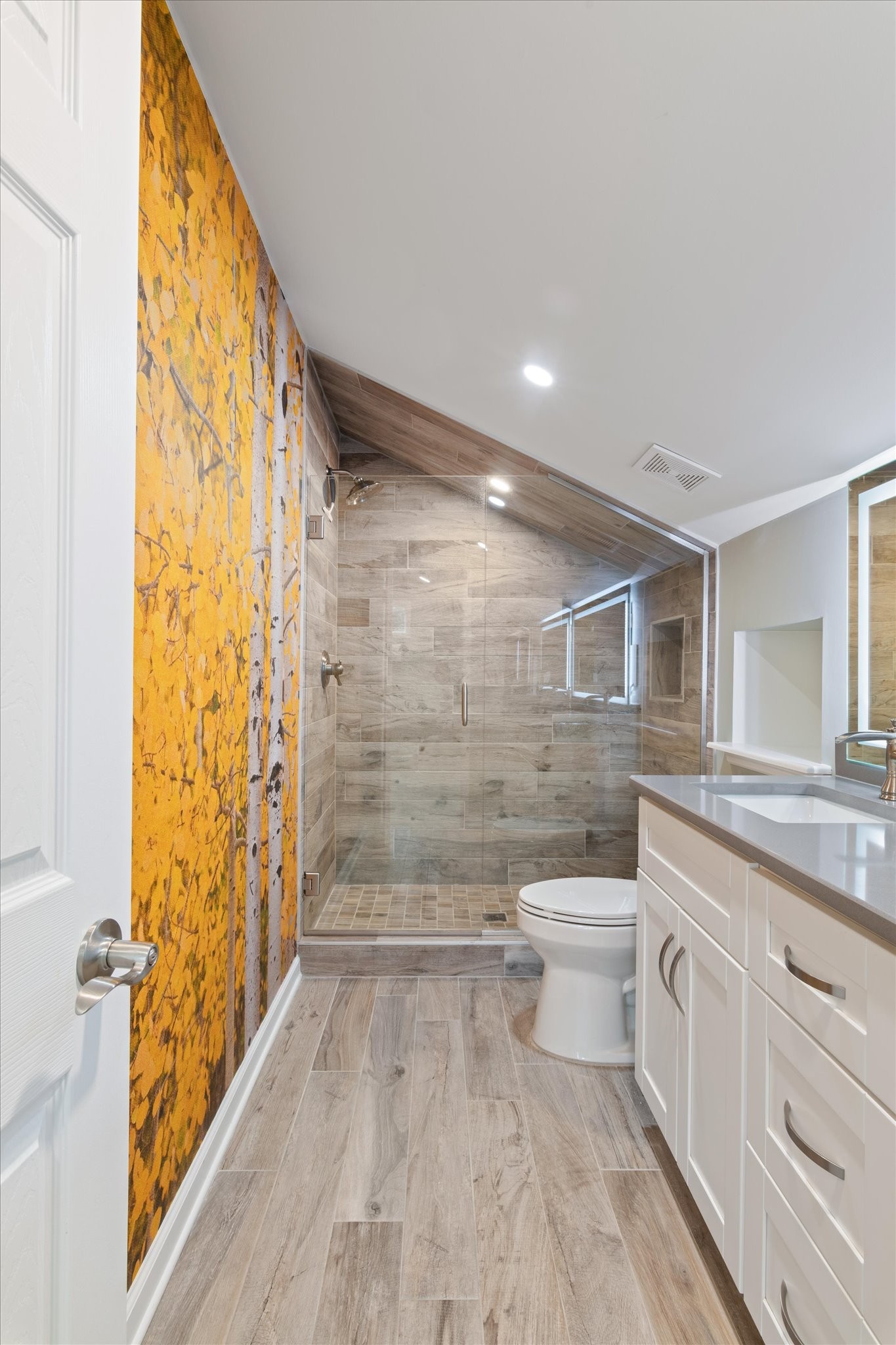 4158 Arno Road Franklin, TN 37064 - Photo 37 of 44 a bathroom with a granite countertop toilet a sink and a shower