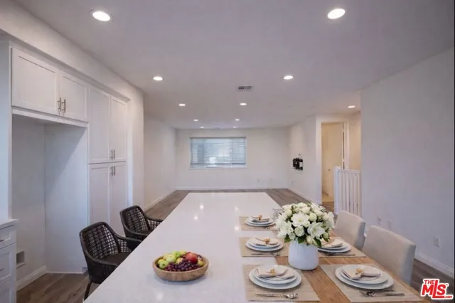 a room with furniture and flowers