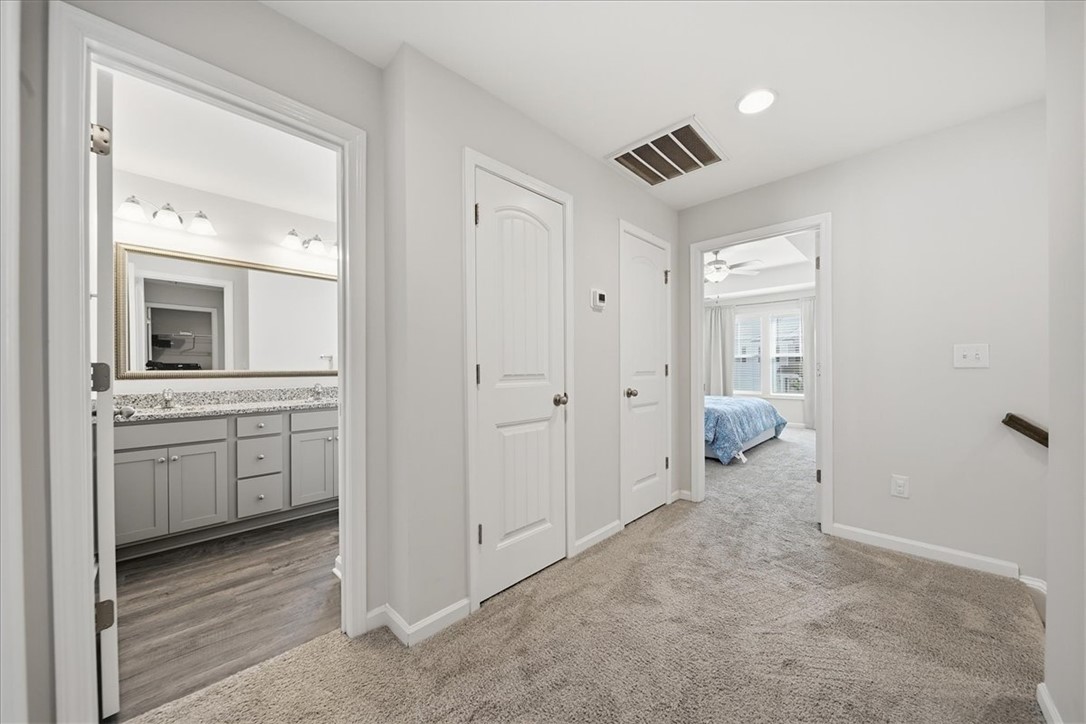 403 Seaborn Circle Pendleton, SC 29670 - Photo 21 of 47 This central hallway provides seamless transitions between well-appointed rooms, including a bedroom and a bathroom.