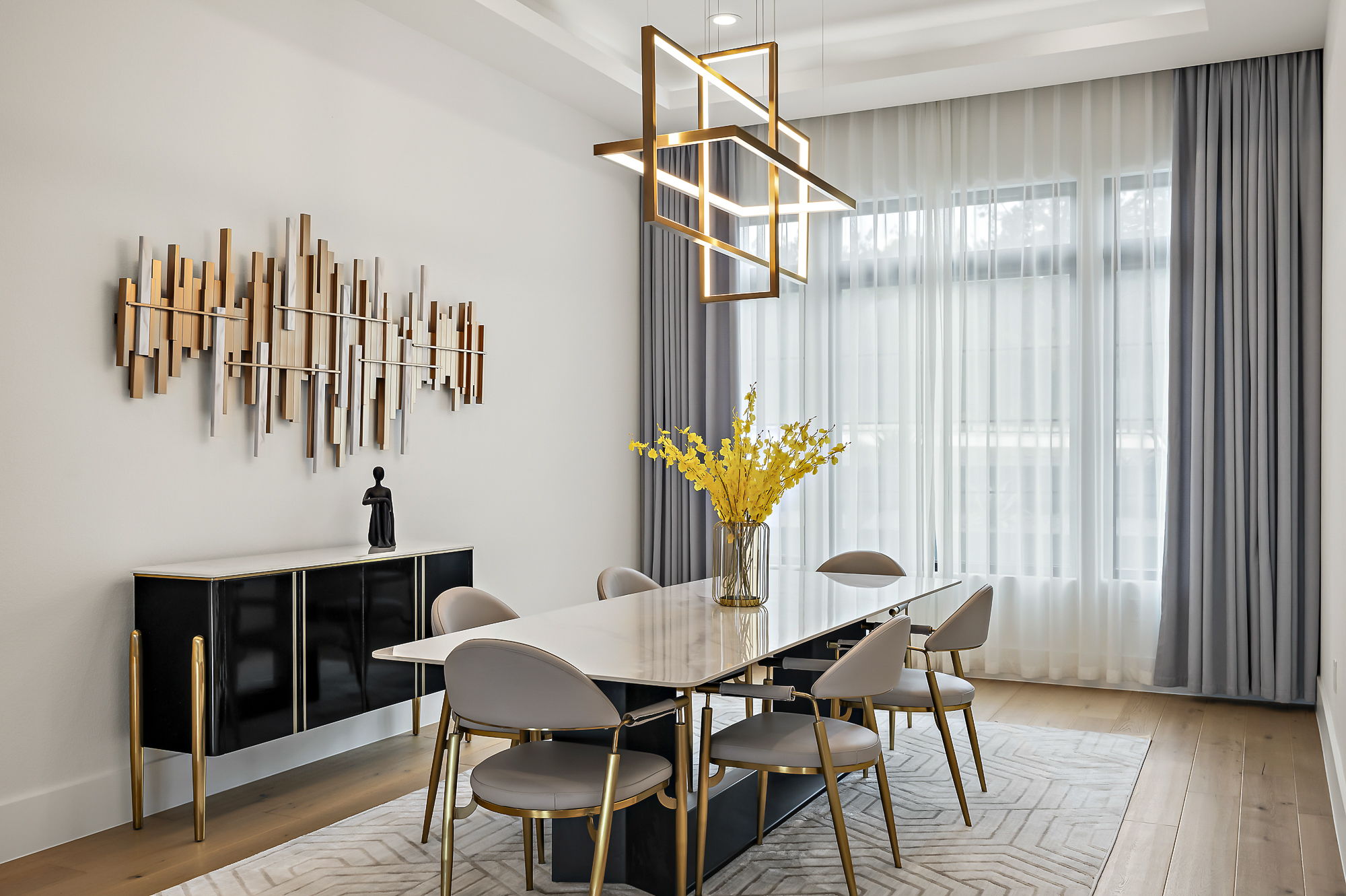 10211 Thistle Ridge Austin, TX 78733 - Photo 11 of 39 a view of a dining room with furniture and wooden floor