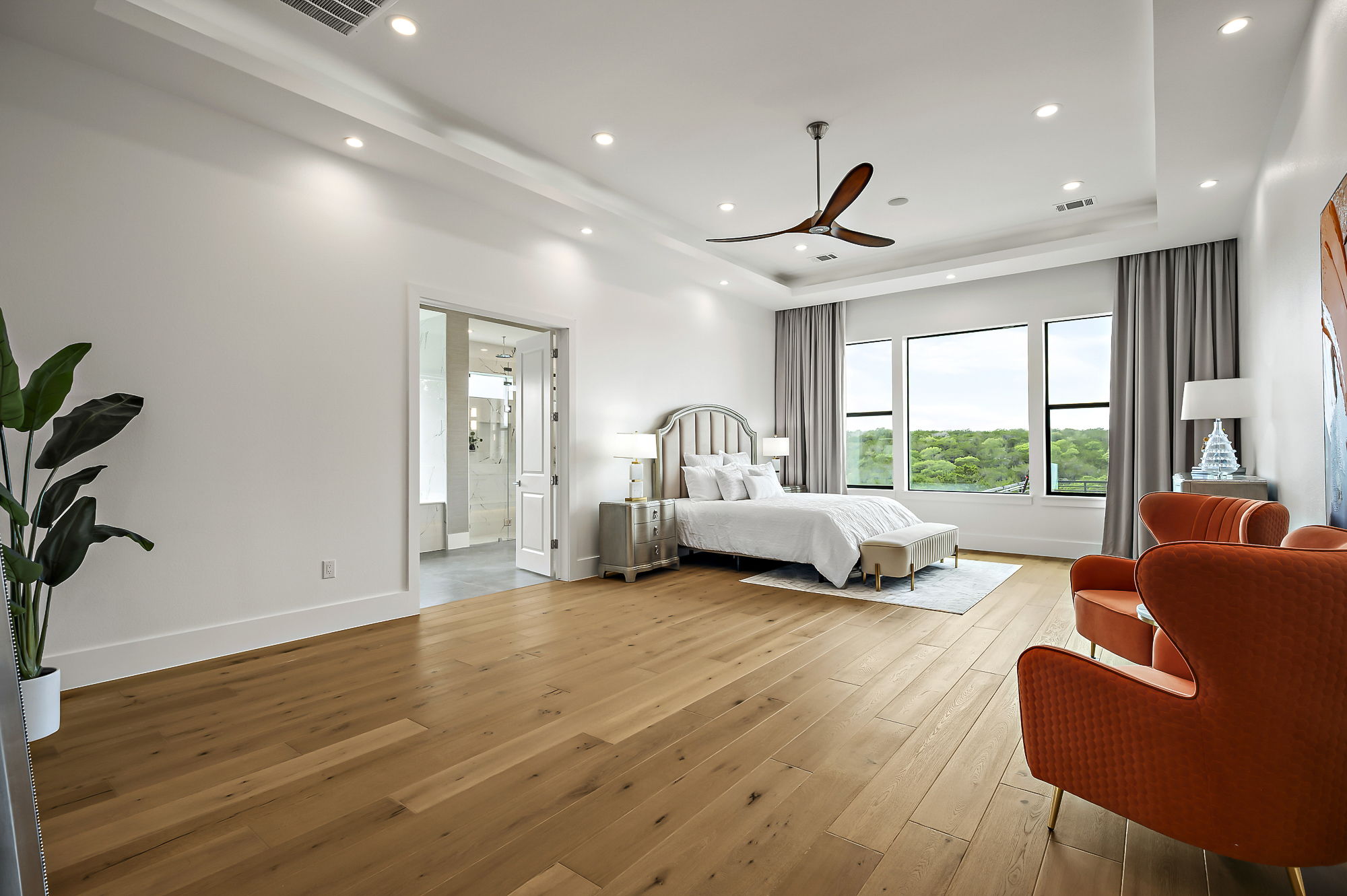 10211 Thistle Ridge Austin, TX 78733 - Photo 18 of 39 a living room with furniture and a large window