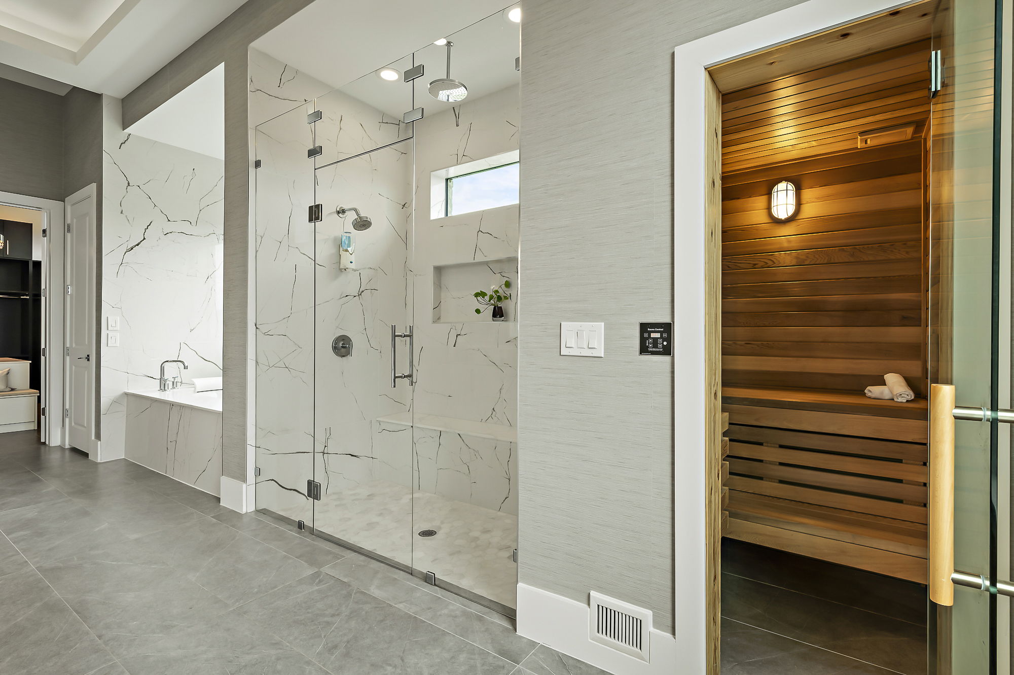 10211 Thistle Ridge Austin, TX 78733 - Photo 21 of 39 a bathroom with a shower