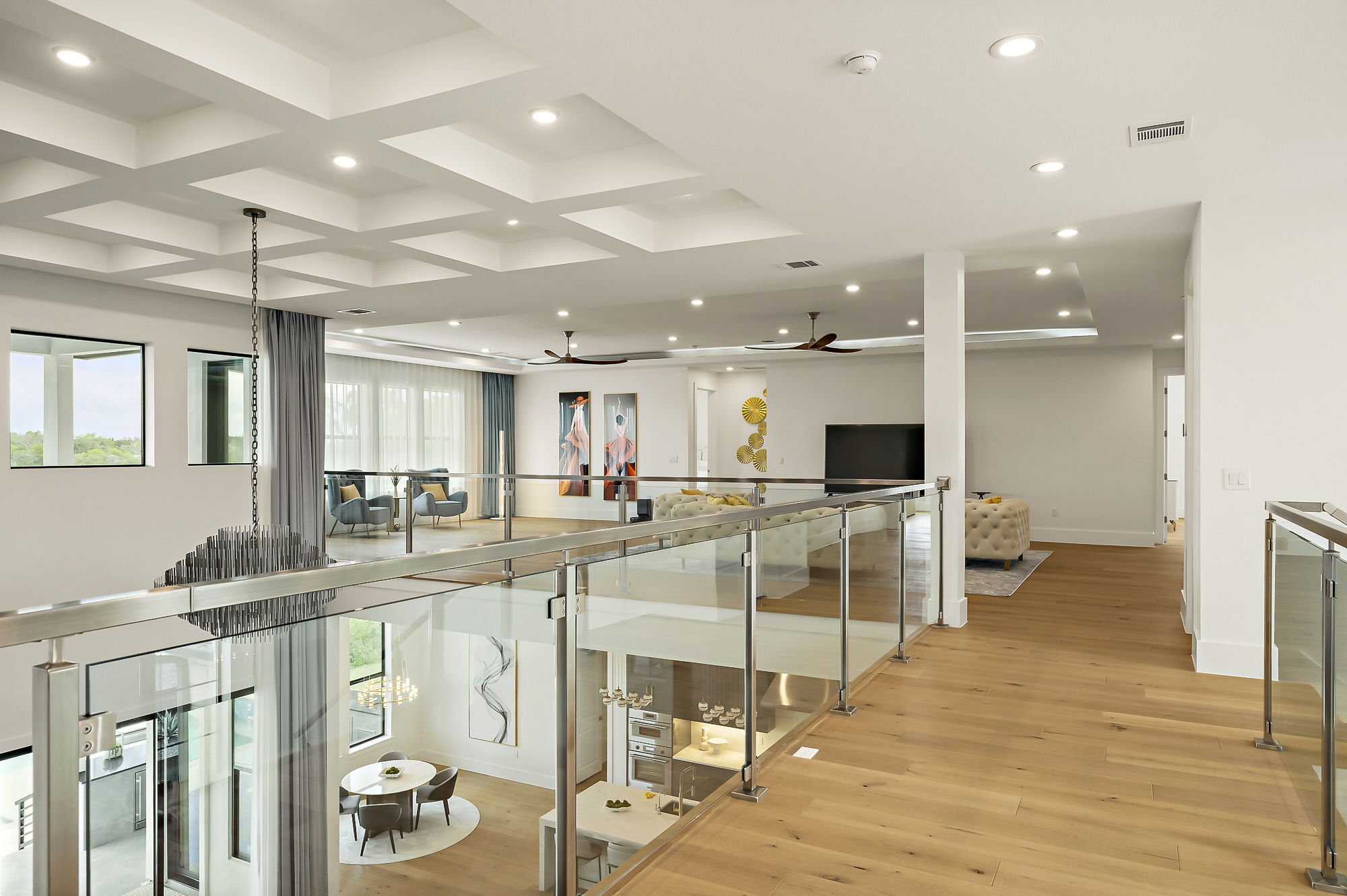 10211 Thistle Ridge Austin, TX 78733 - Photo 29 of 39 a large room with lots of table chair and glass door