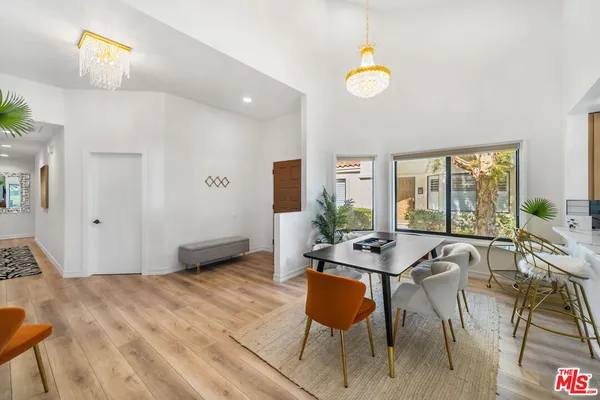 a view of a livingroom with furniture and window