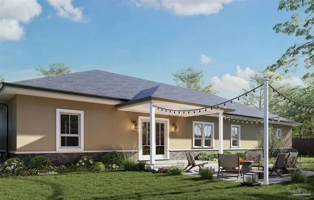 front view of a house with a yard