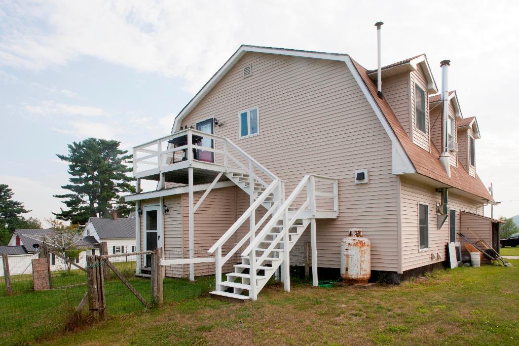 1223 Great Pond Road Aurora, ME 04408 - Photo 6 of 28 Backyard has 2nd floor deck and back...