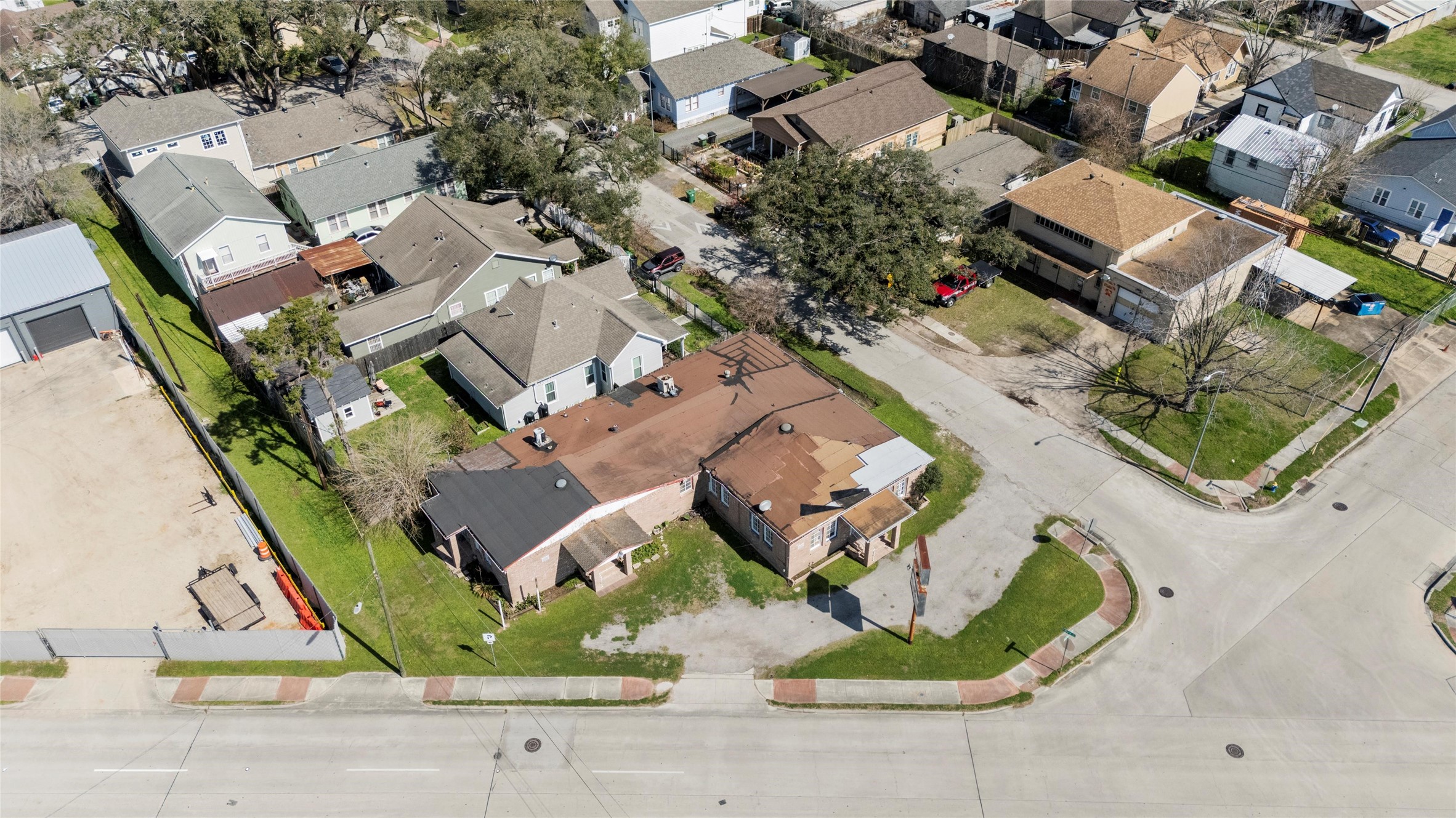 4110 North Main Street Houston, TX 77009 - Photo 12 of 19 an aerial view of a house with garden space and parking