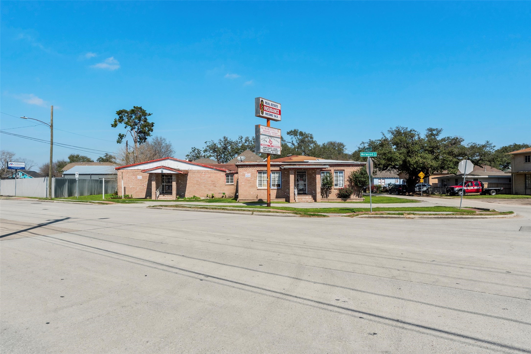 4110 North Main Street Houston, TX 77009 - Photo 6 of 19 a aerial view of a house with a big yard and large trees