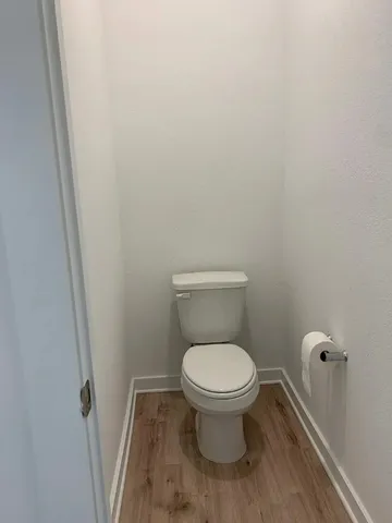 a bathroom with a toilet and a sink