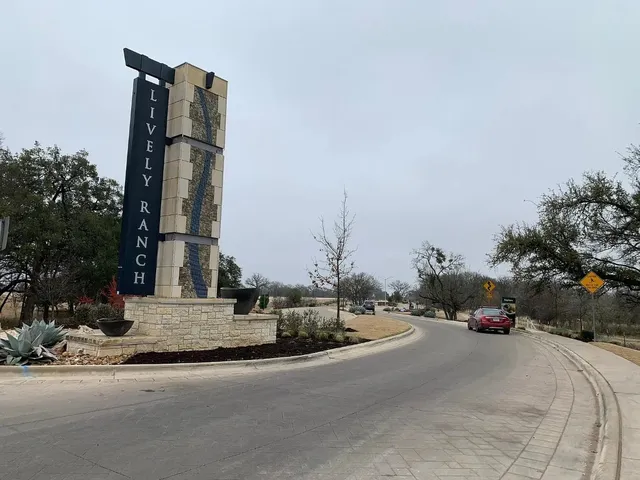 a view of street with tall buildings