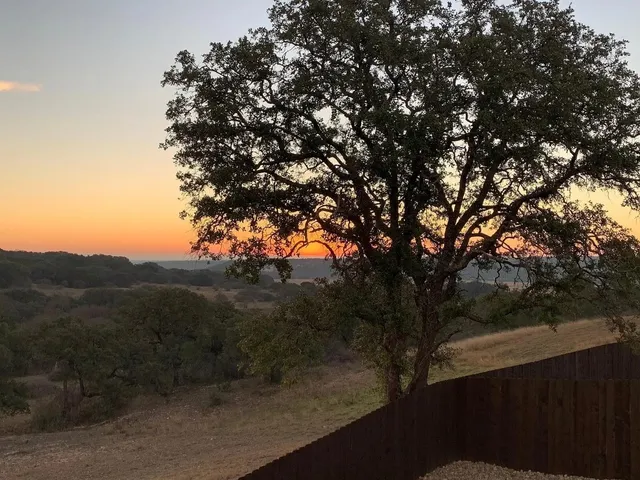a view of mountain view with lots of trees