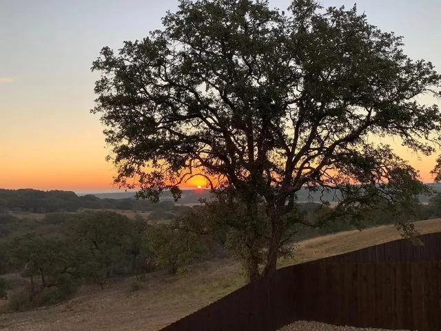 a view of mountain view with lots of trees
