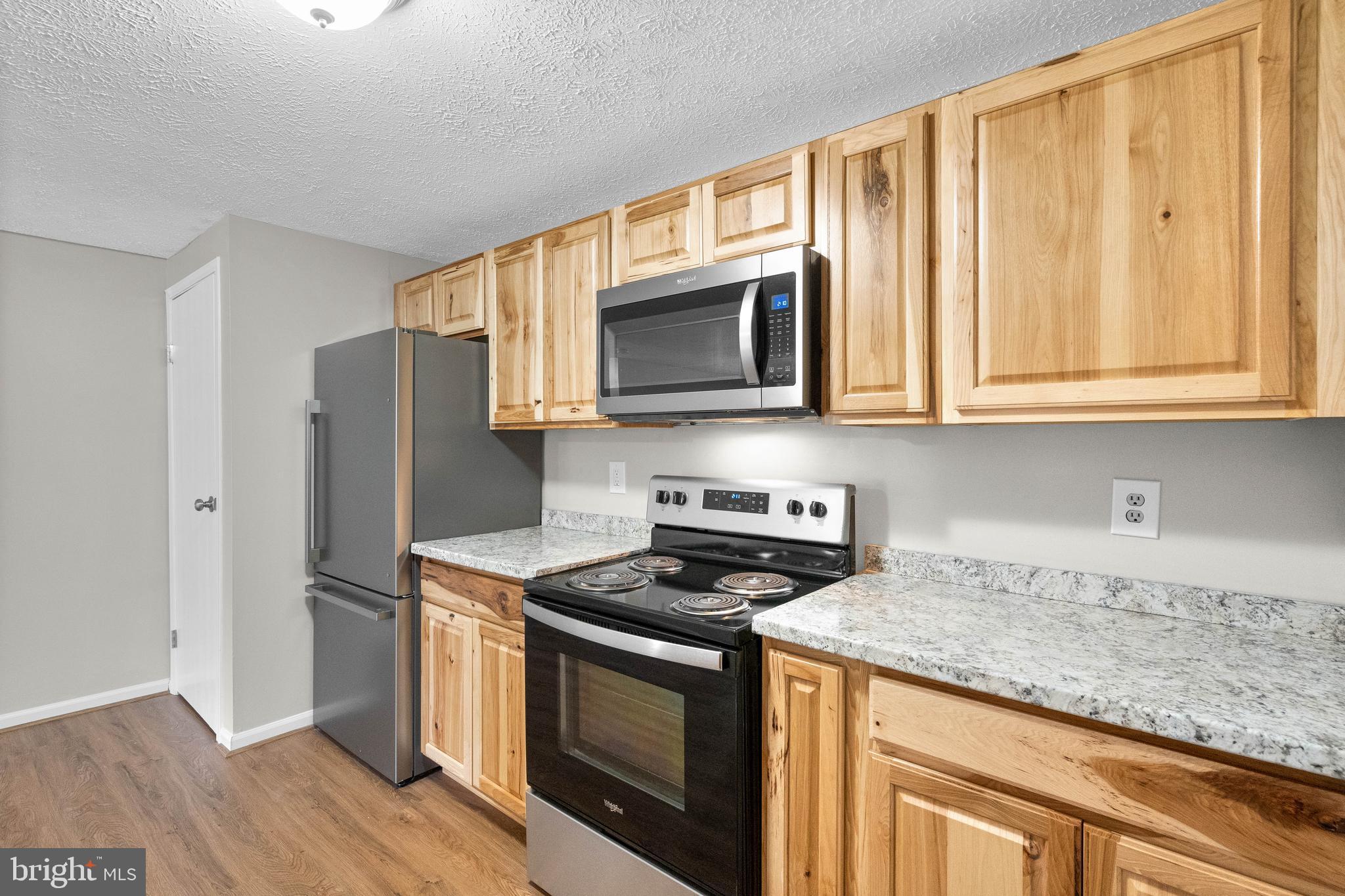 3925 Greencastle Road, Unit 103 Burtonsville, MD 20866 - Photo 12 of 24 Kitchen