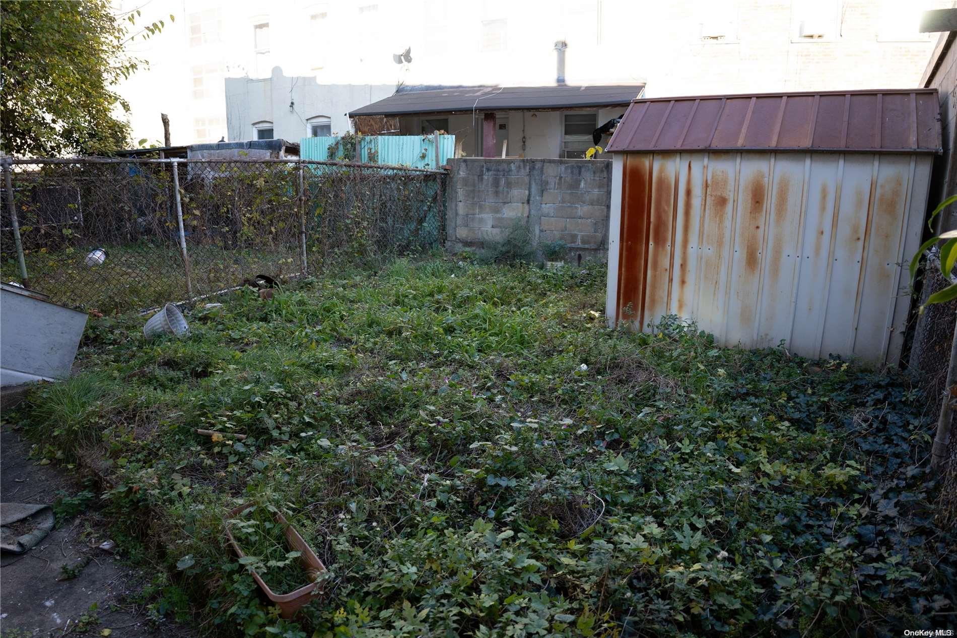 40-61 Junction Boulevard Queens, NY 11368 - Photo 12 of 13 a view of a backyard