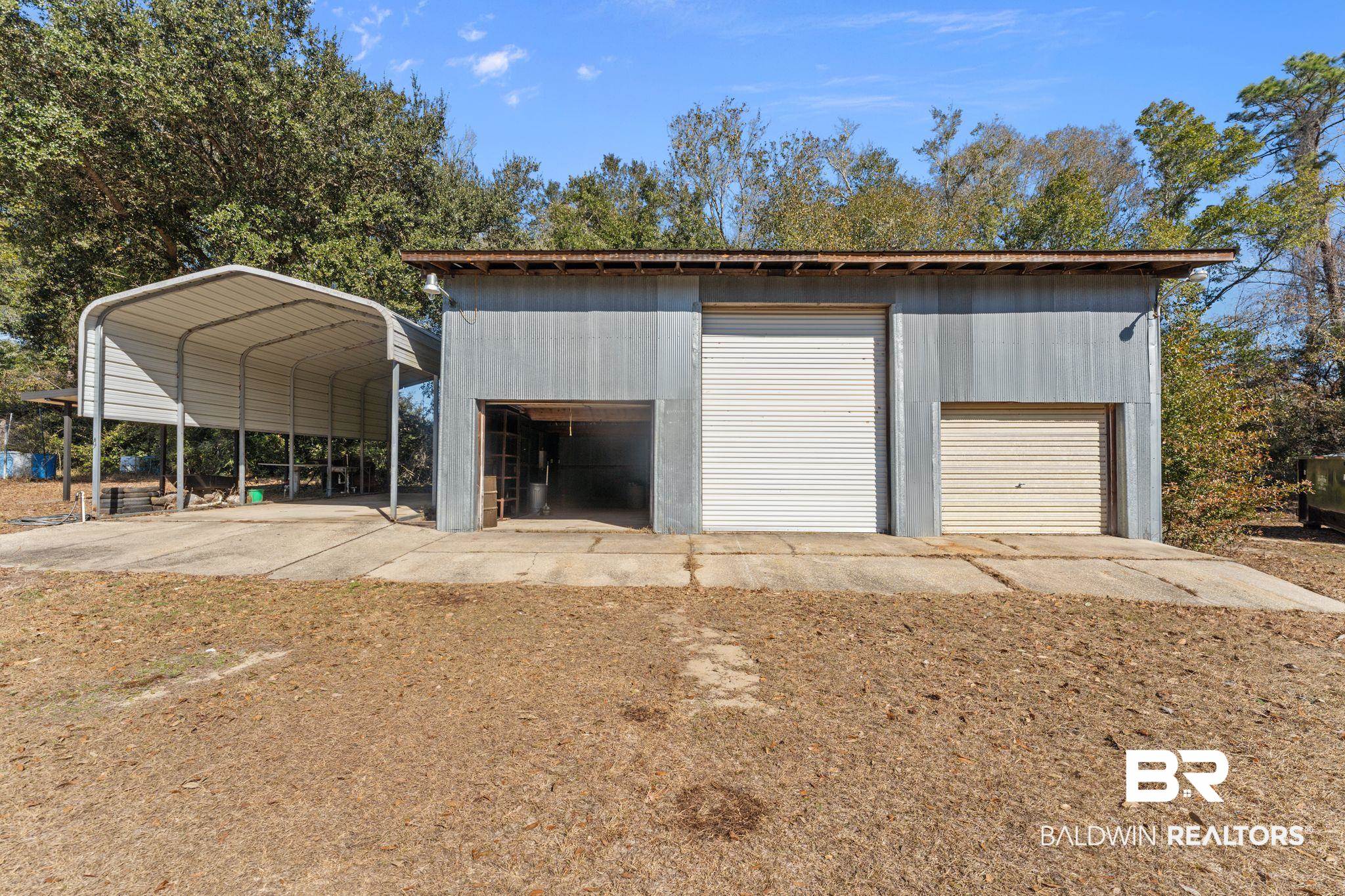 32989 Antietam Road Lillian, AL 36549 - Photo 31 of 56 Garage with a detached garage