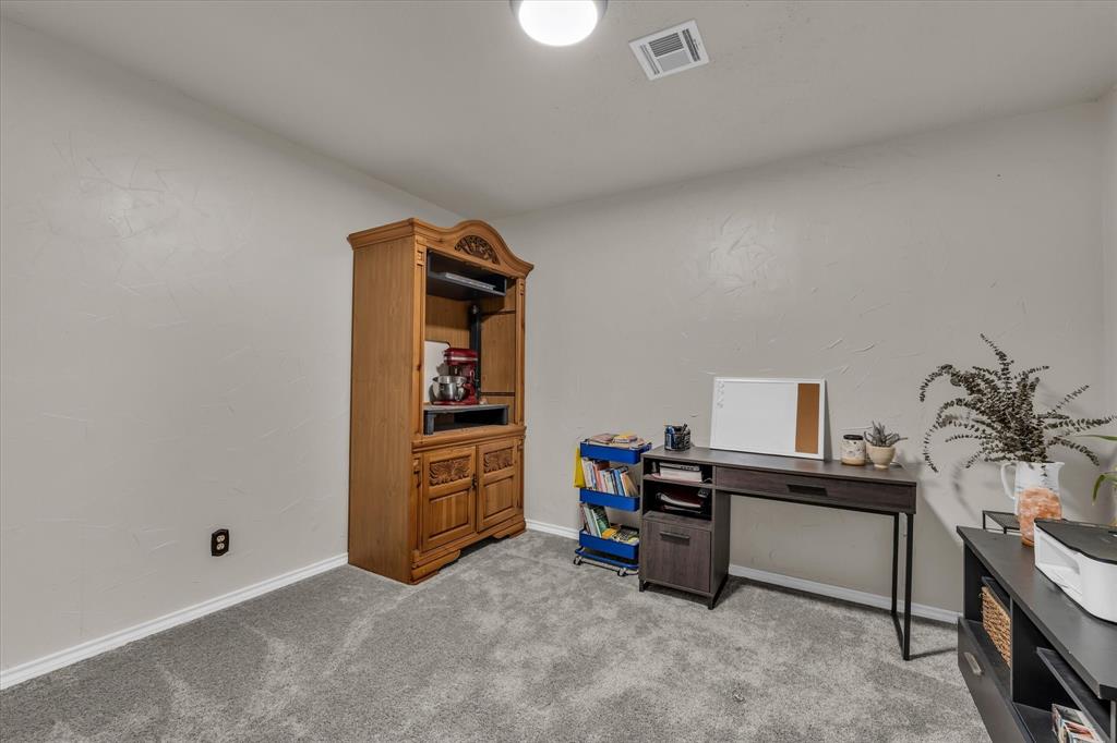 1007 North 57th Street Waco, TX 76710 - Photo 12 of 38 a view of a workspace with furniture