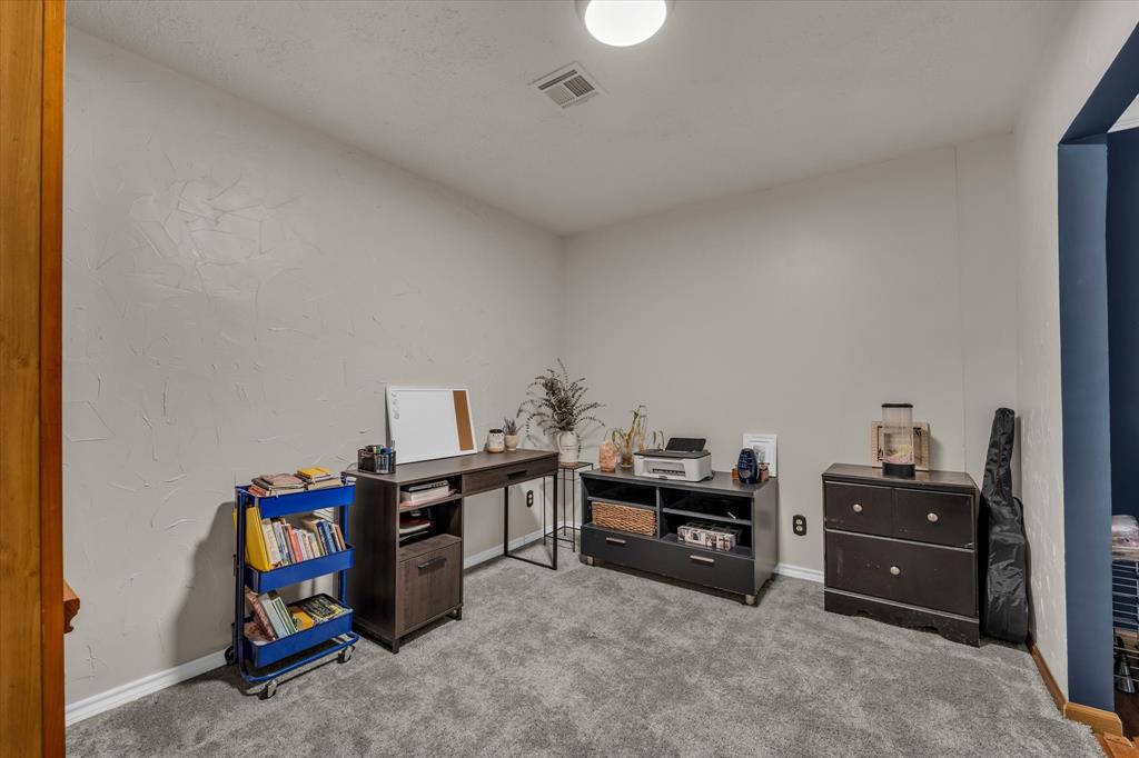 1007 North 57th Street Waco, TX 76710 - Photo 13 of 38 a view of a workspace with furniture