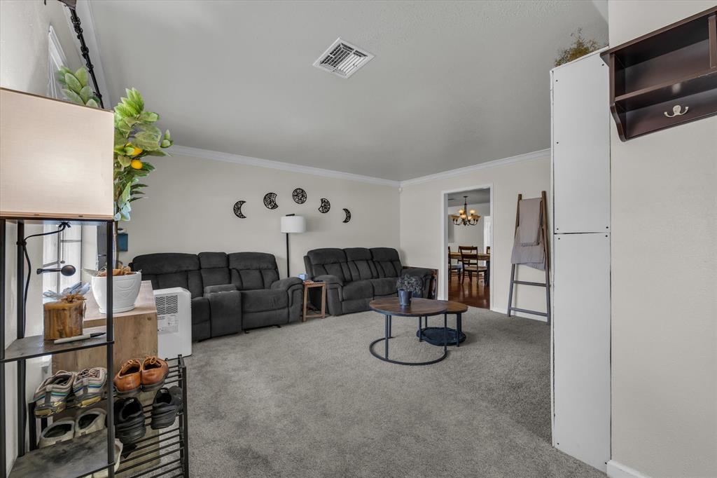 1007 North 57th Street Waco, TX 76710 - Photo 18 of 38 a living room with furniture and a flat screen tv