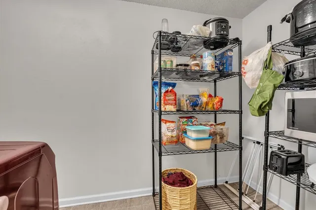 a room with lots of different colored cloths