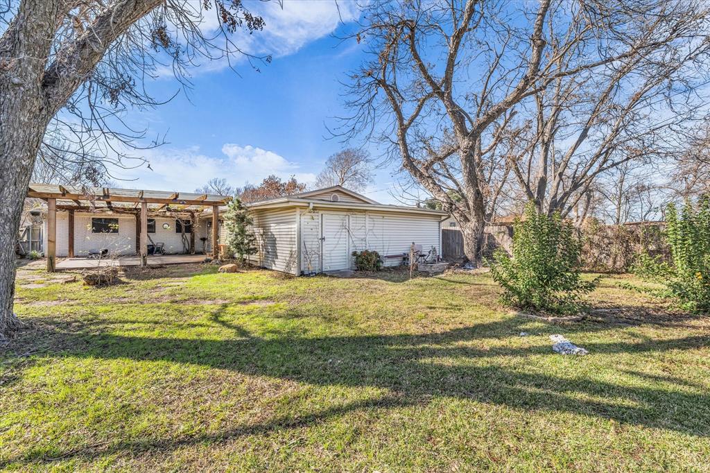 1007 North 57th Street Waco, TX 76710 - Photo 29 of 38 a front view of a house with a yard