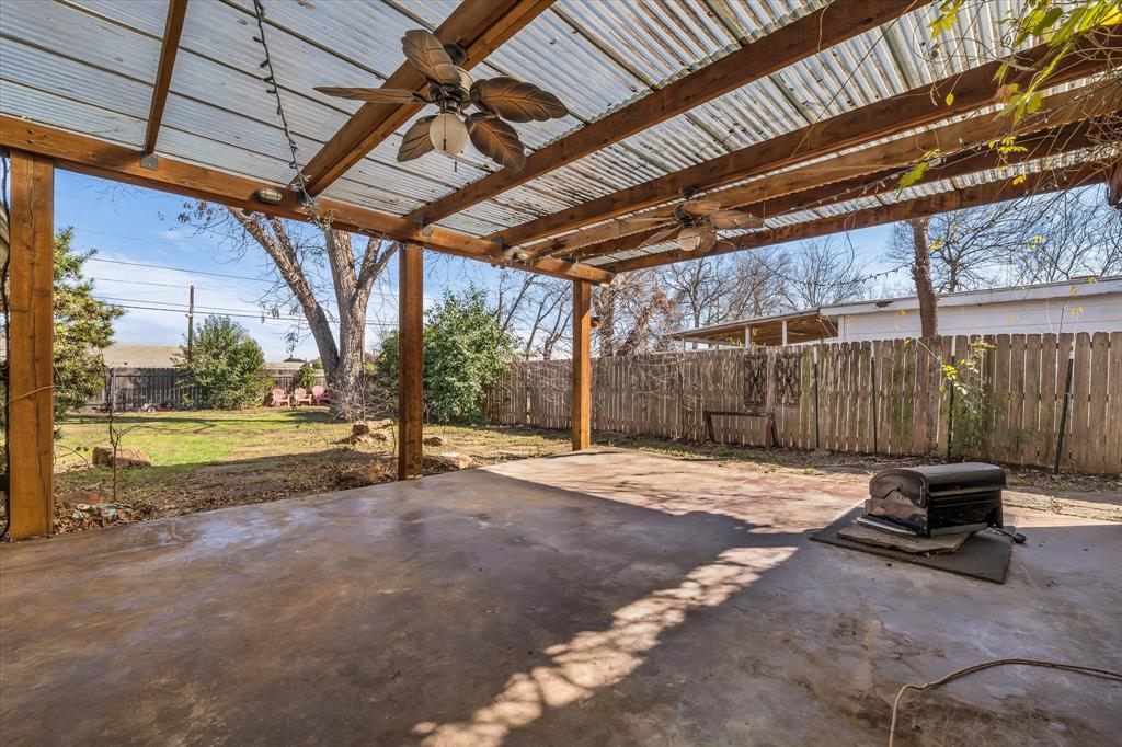1007 North 57th Street Waco, TX 76710 - Photo 30 of 38 a view of a backyard with wooden floor and roof
