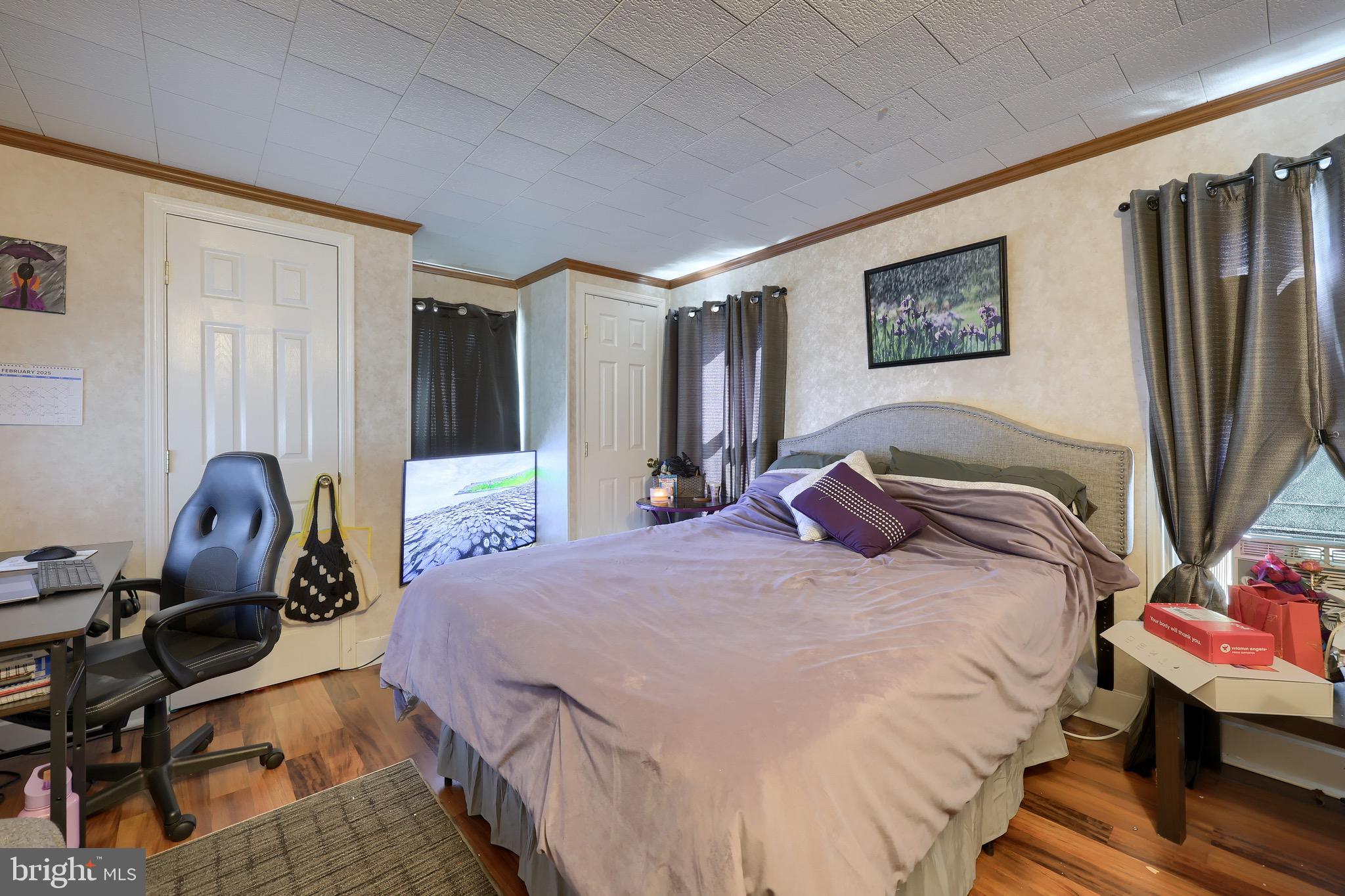 38 Montello Road Reading, PA 19608 - Photo 13 of 25 a bedroom with a bed a desk and chair