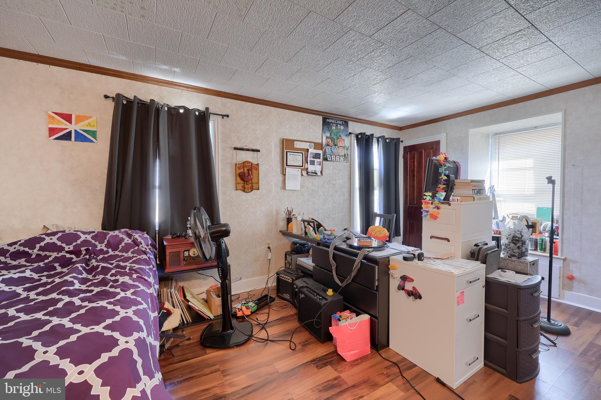 38 Montello Road Reading, PA 19608 - Photo 14 of 25 a room with furniture a rug and a wooden floor