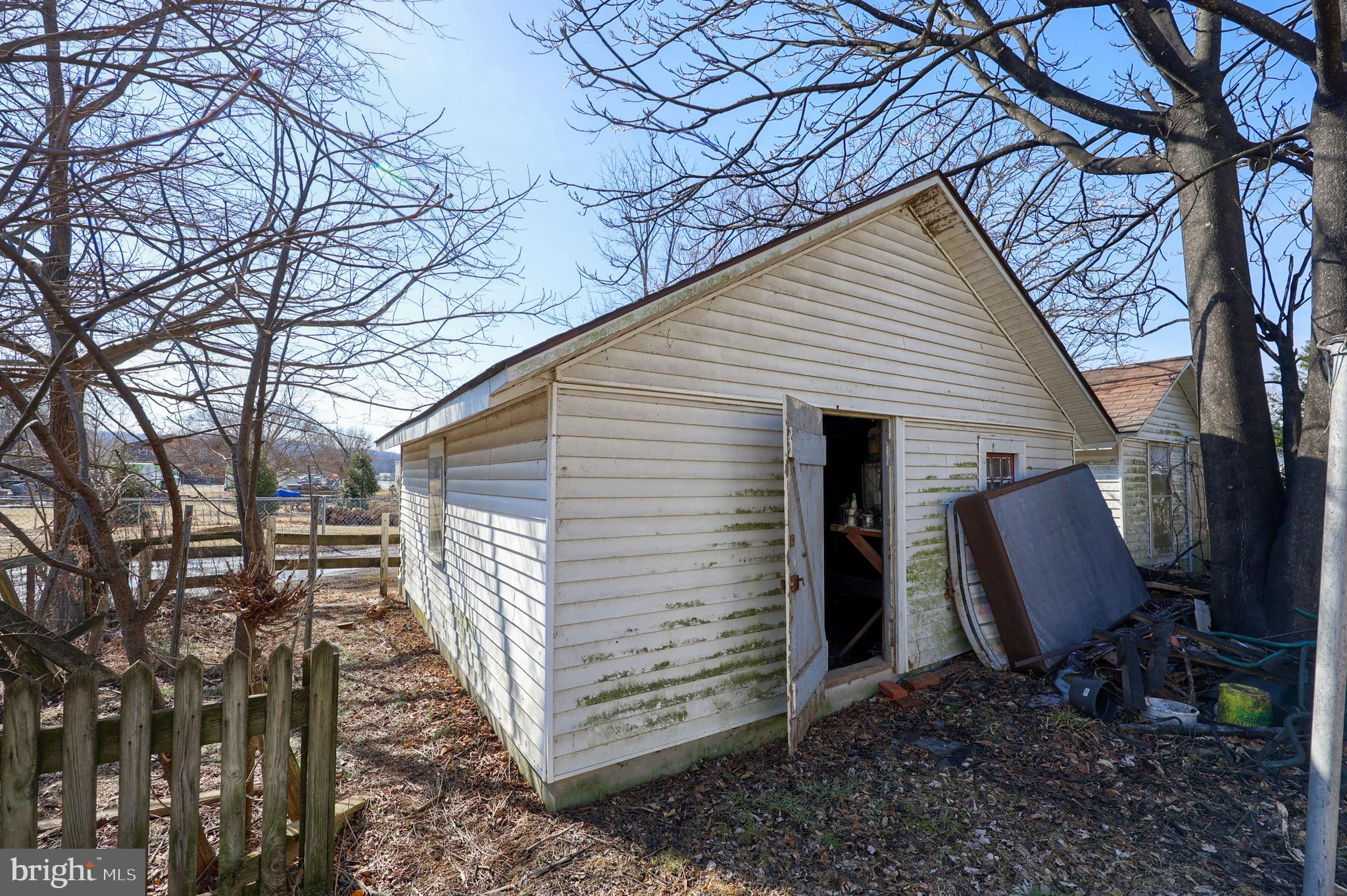 38 Montello Road Reading, PA 19608 - Photo 24 of 25 a view of a small house in the back yard