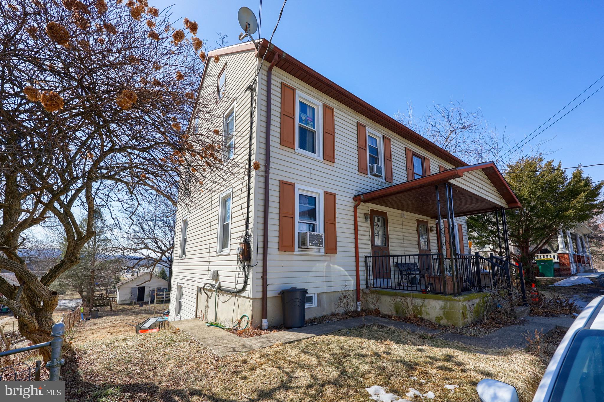38 Montello Road Reading, PA 19608 - Photo 3 of 25 a front view of a house with a yard
