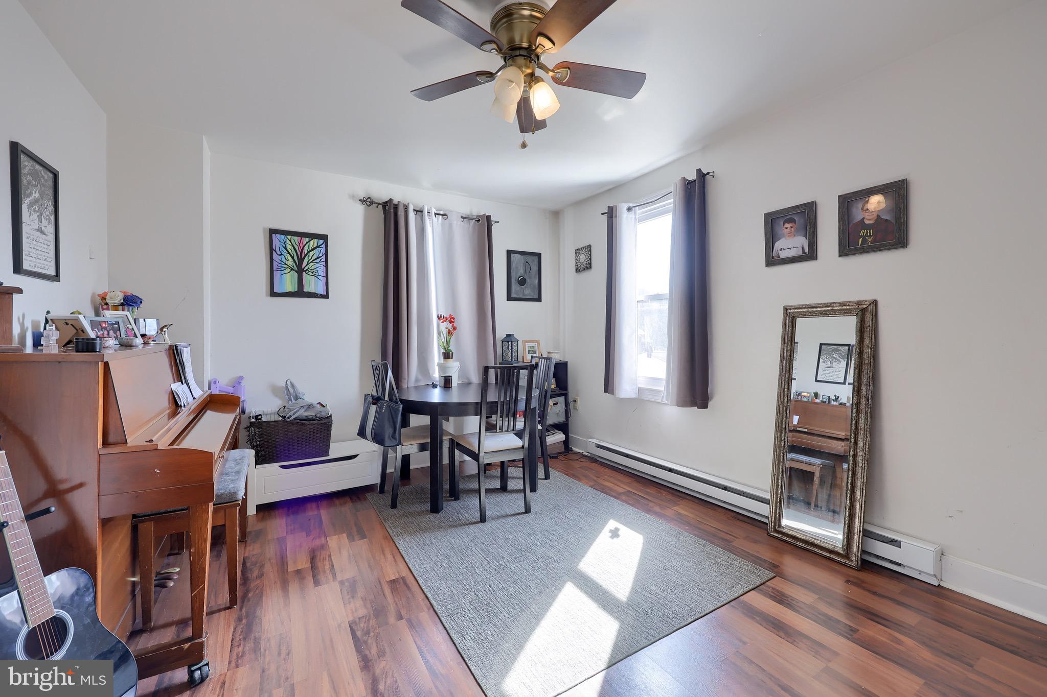 38 Montello Road Reading, PA 19608 - Photo 8 of 25 a living room with furniture and a wooden floor