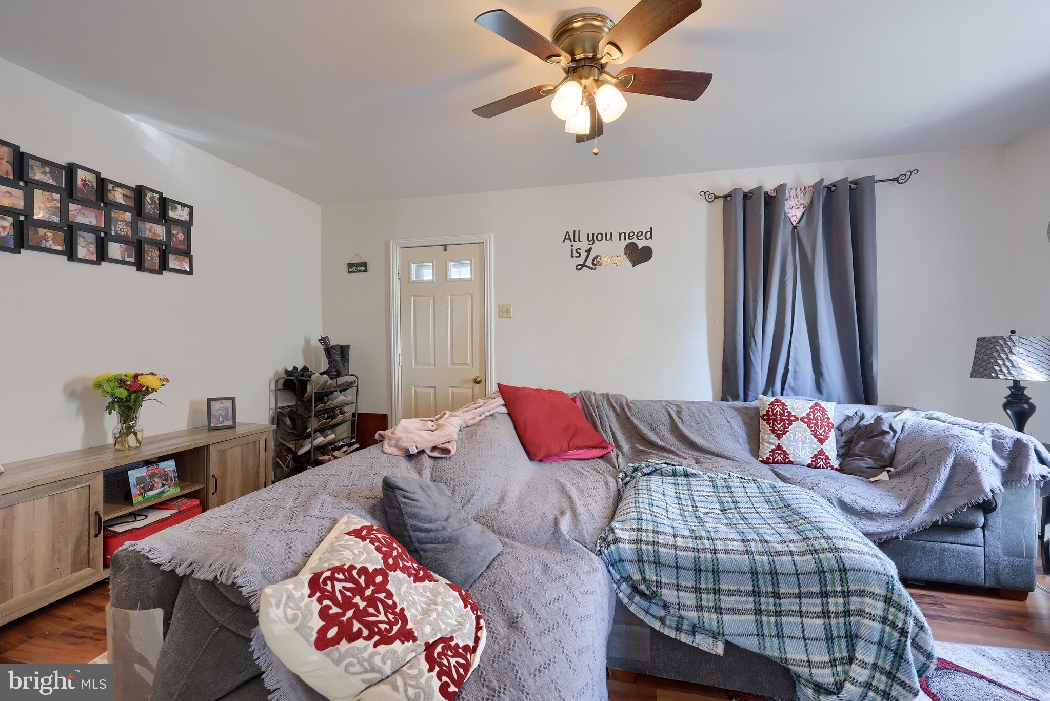38 Montello Road Reading, PA 19608 - Photo 9 of 25 a bedroom with a bed and a chandelier