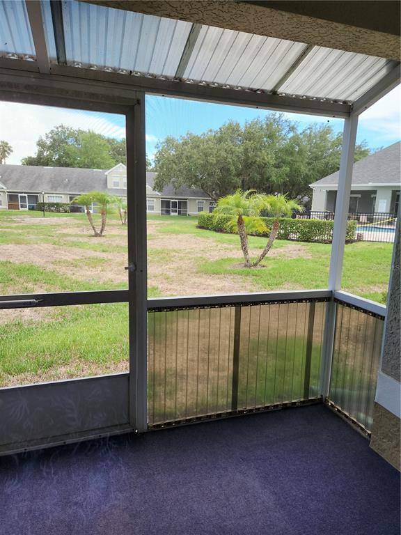 3648 Kings Road, Unit 103 Palm Harbor, FL 34685 - Photo 11 of 26 a view of outdoor space and deck