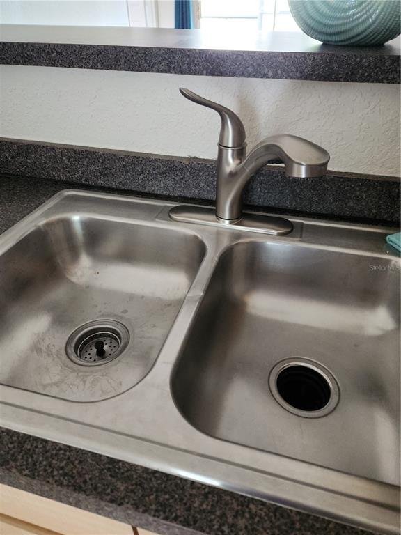 3648 Kings Road, Unit 103 Palm Harbor, FL 34685 - Photo 15 of 26 a close view of sink
