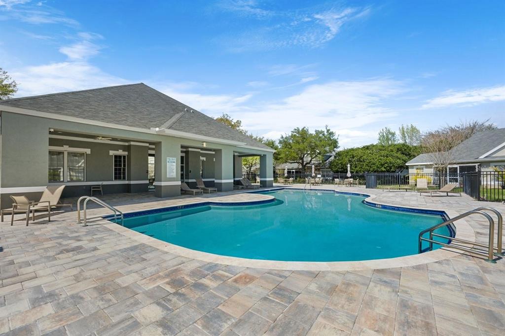 3648 Kings Road, Unit 103 Palm Harbor, FL 34685 - Photo 26 of 26 a view of outdoor space yard swimming pool and patio