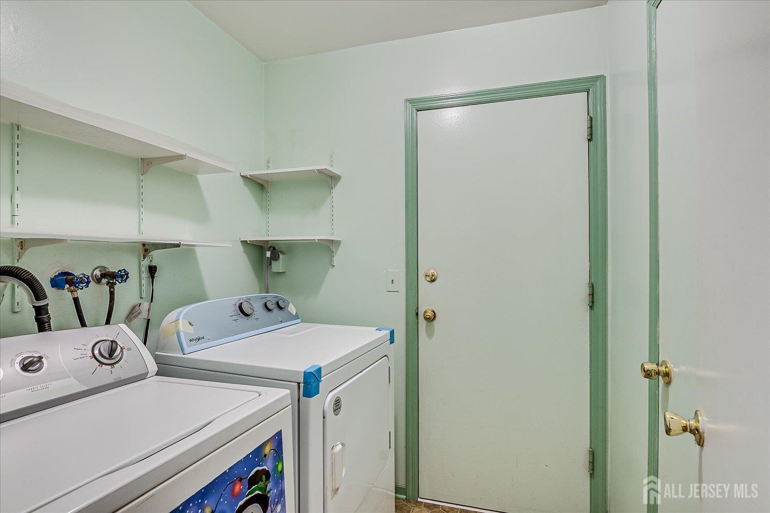 536 Elsie Avenue South Plainfield, NJ 07080 - Photo 14 of 28 a utility room with dryer and washer
