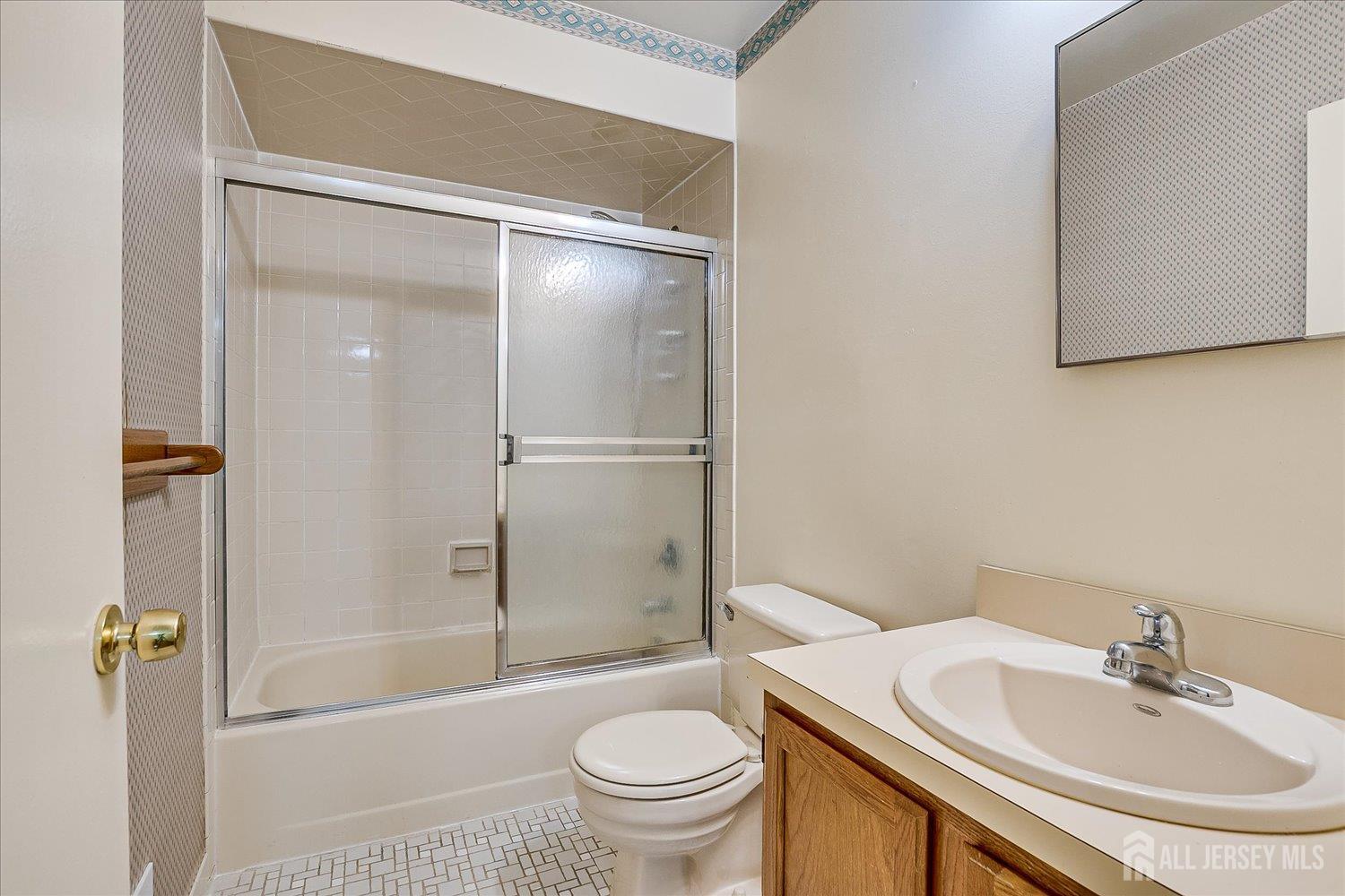 536 Elsie Avenue South Plainfield, NJ 07080 - Photo 24 of 28 a bathroom with a sink toilet and shower