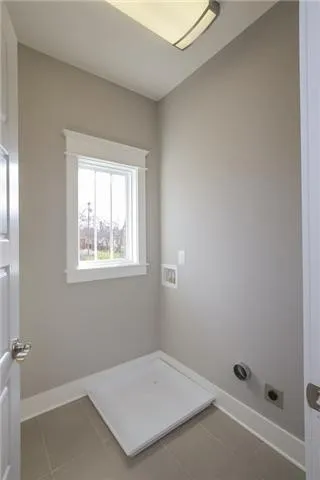 a view of a room that has a window in it