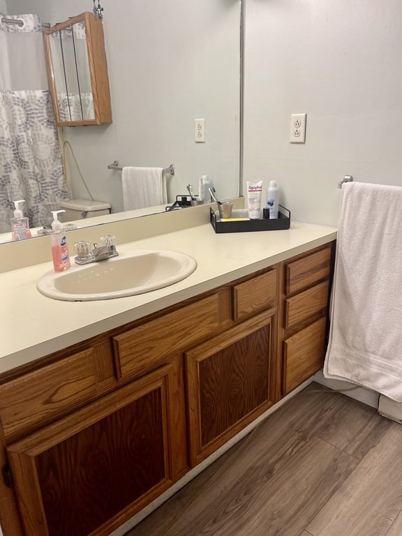2 Oden Avenue, Unit 3 Worcester, MA 01604 - Photo 9 of 9 a bathroom with a sink and a mirror