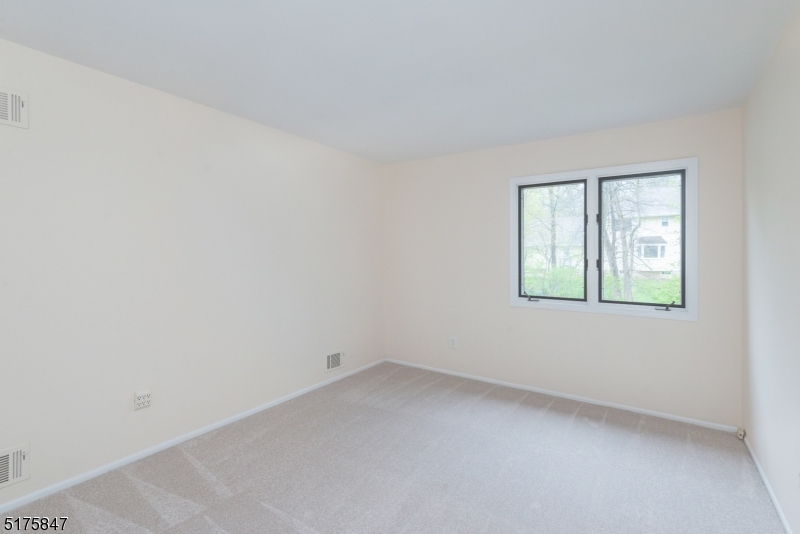 71 Patriots Road Morris Plains, NJ 07950 - Photo 14 of 18 an empty room with a window