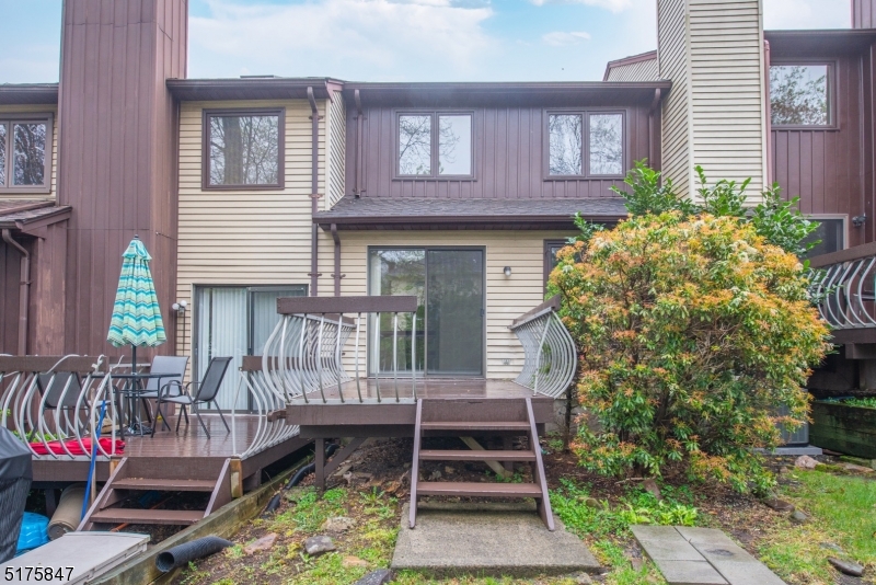 71 Patriots Road Morris Plains, NJ 07950 - Photo 18 of 18 a front view of a house with outdoor seating