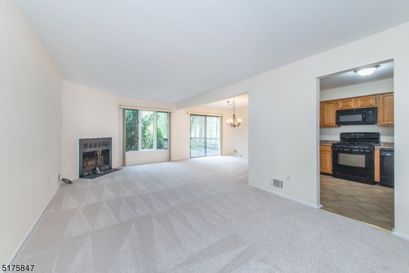 71 Patriots Road Morris Plains, NJ 07950 - Photo 7 of 18 a view of a livingroom with a fireplace