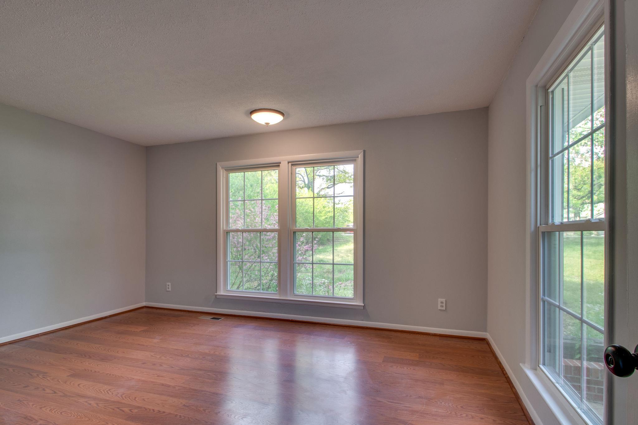 7431 Johnny Crow Road Lyles, TN 37098 - Photo 12 of 22 Large master has is bright with large windows.